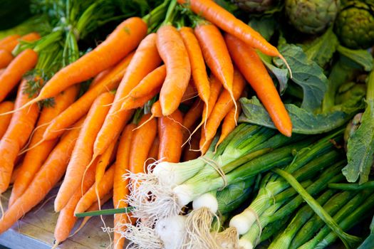 Fresh vegetables at market stall.