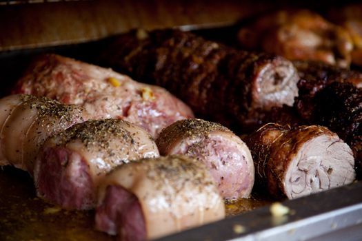 Delicious roasted meat in roasting pan.