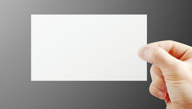 Hand holding paper