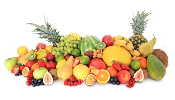Pile of various fruits. Isolated on white background.
