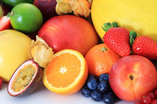 Pile of various fruits. Background texture.