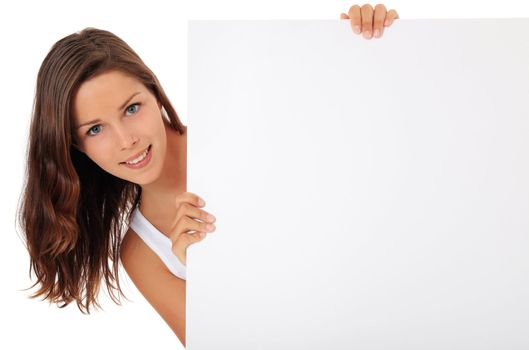 Attractive young woman behind a blank white sign. All on white background.