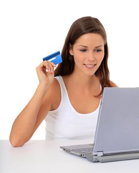 Attractive woman ordering things on the internet. All on white background.