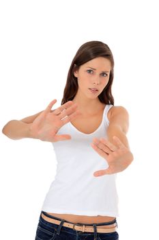 Attractive young woman making repelling gesture. All on white background.