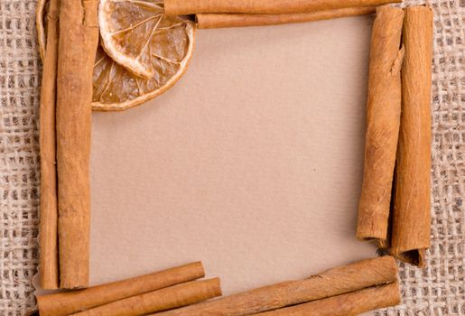 old paper for recipes and spices on burlap closeup