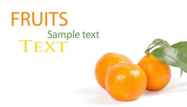 Tangerines with green leaves isolated on white