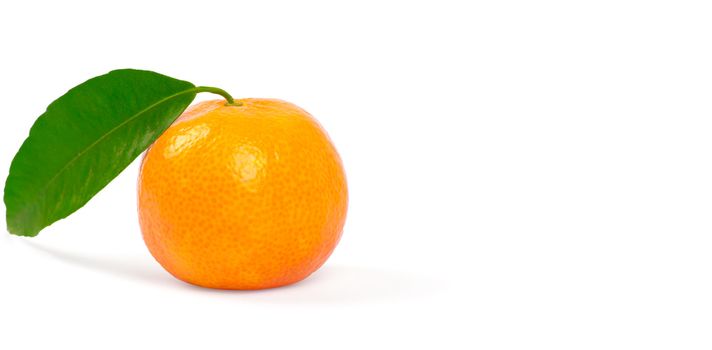 Tangerine with green leaves isolated on white