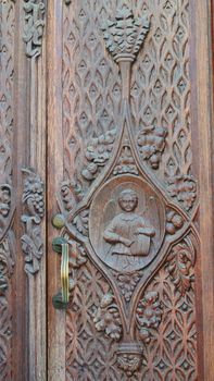 Detail of the wooden door of a church