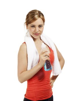 happy fitness woman with a bottle of water and a white towel on white background