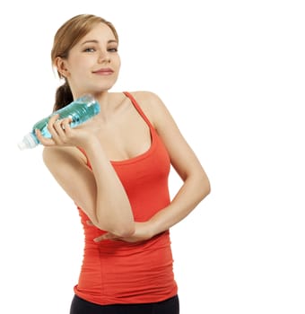 confident smiling young fitness woman with a bottle of water on white background
