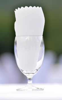 tissue paper in glass on the table