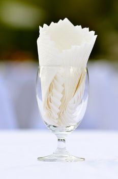 tissue paper in glass on the table