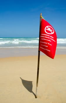 no swim sign at karon beach, thailand