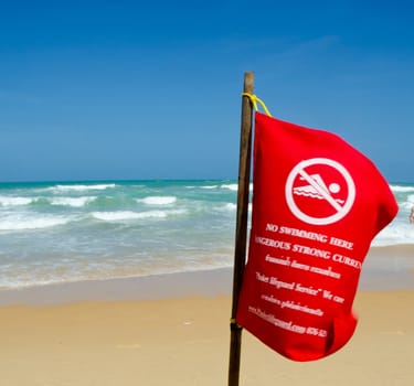 no swim sign at karon beach, thailand