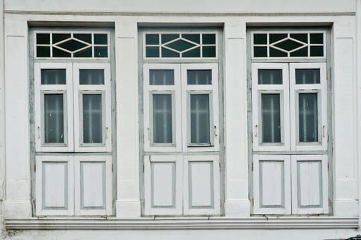 old window in phuket, thailand