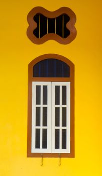 old window in phuket, thailand