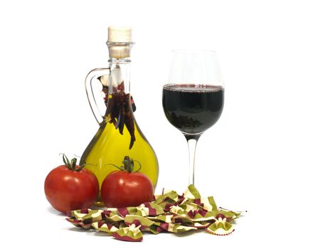tomato bottle of oil and glass red wine with pasta