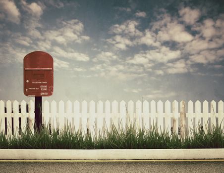 retro style picture of postbox at roadside