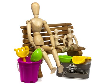 father and kids sitting on a wooden seat