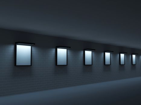 Dark gallery with paintings on the brick wall