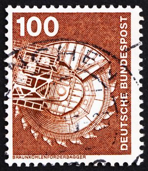GERMANY - CIRCA 1975: a stamp printed in the Germany shows Bituminous Coal Excavator, circa 1975