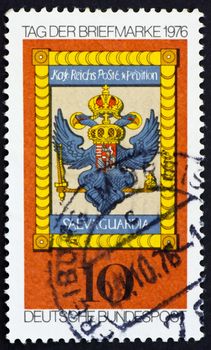 GERMANY - CIRCA 1976: a stamp printed in the Germany shows German Imperial Post Emblem, Hochst am Main, 18th Century, Stamp Day, circa 1976