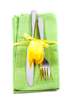 Fork and knife on napkin, served for dinner