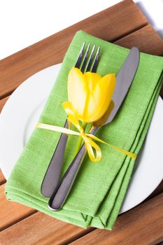 Fork and knife and plate, served for dinner