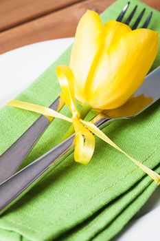 Fork and knife and plate, served for dinner