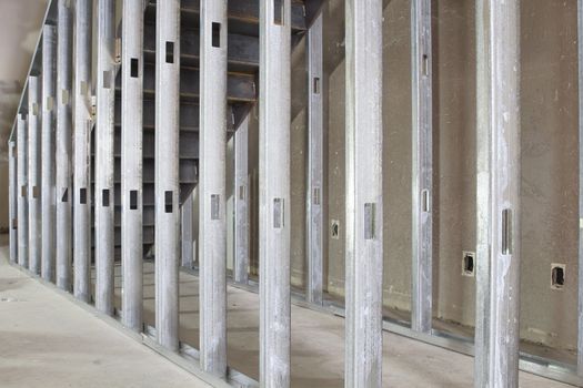 Metal Stud Framing Under the Steel Staircase in Commercial Space