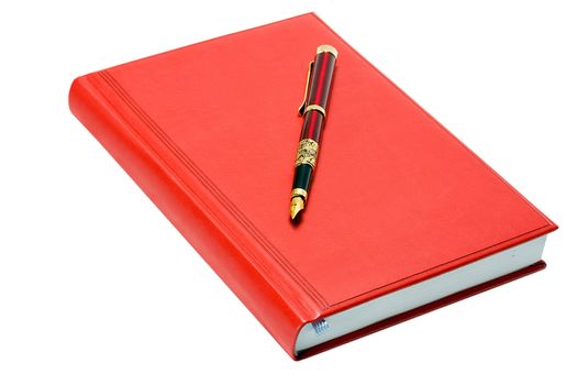 Business fountain pen on red organizer isolated on white background