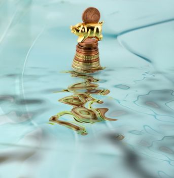 coin in piggy bank reflections of the wave sea lighthouse