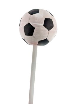 black and white soccer ball lollipop sweetmeat isolated