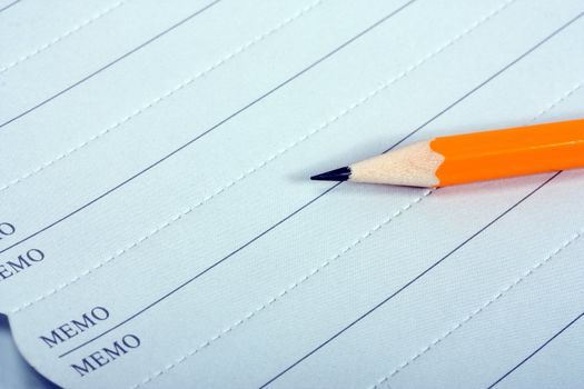 memo pencil close up isolated on white background