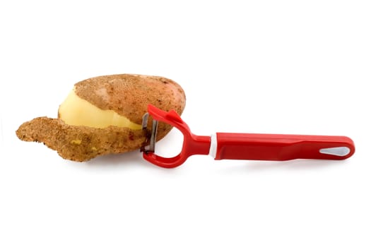 Red plastic vegetable peeler isolated on white background