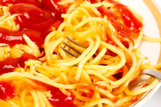 pasta in fork on dish food background