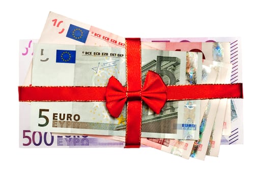 Stack of euro bills with red ribbon isolated on white background