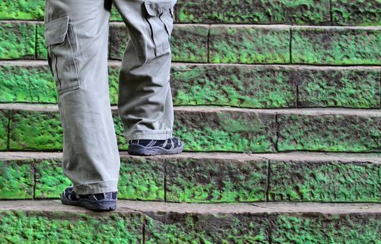 a man walking up stair 