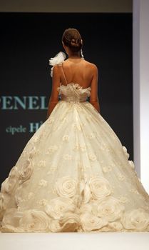 ZAGREB, CROATIA - FEBRUARY 19: Fashion model walks the runway in wedding dress on 'Wedding days' show, February 19, 2012 in Zagreb, Croatia.