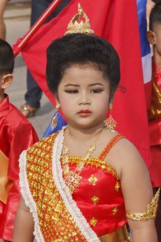 CHIYA, SURATTHANEE - JULY 13 : The unidentified Thai school children are performing their outdoor in Dogbua game parade on July 13, 2012 at Chiya, Surathanee, Thailand.