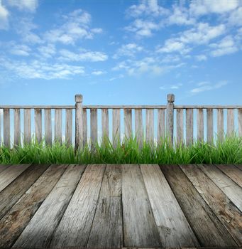 old wooden terrace and blue sky