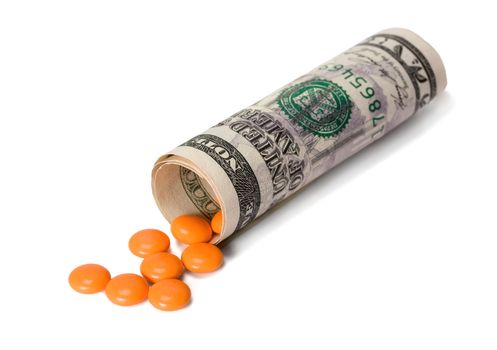 drugs in dollar isolated on white background