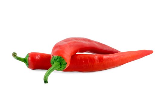 two red pepper close up isolated on white background