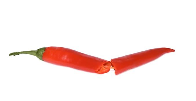 Red hot chili peppers on white background.