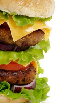 Tasty Double Cheeseburger with beef, tomato, letucce and cheese closeup clipping path