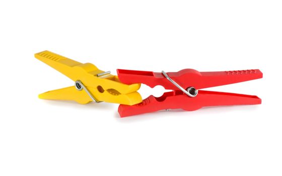 clothes-peg concept aggression isolated on white background