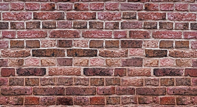 old weathered stained red brick wall background