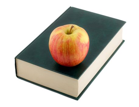 apple on book isolated on white background