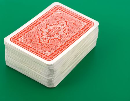 playing cards on green background