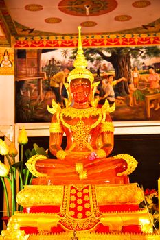 Buddha statue is located at a temple in Thailand